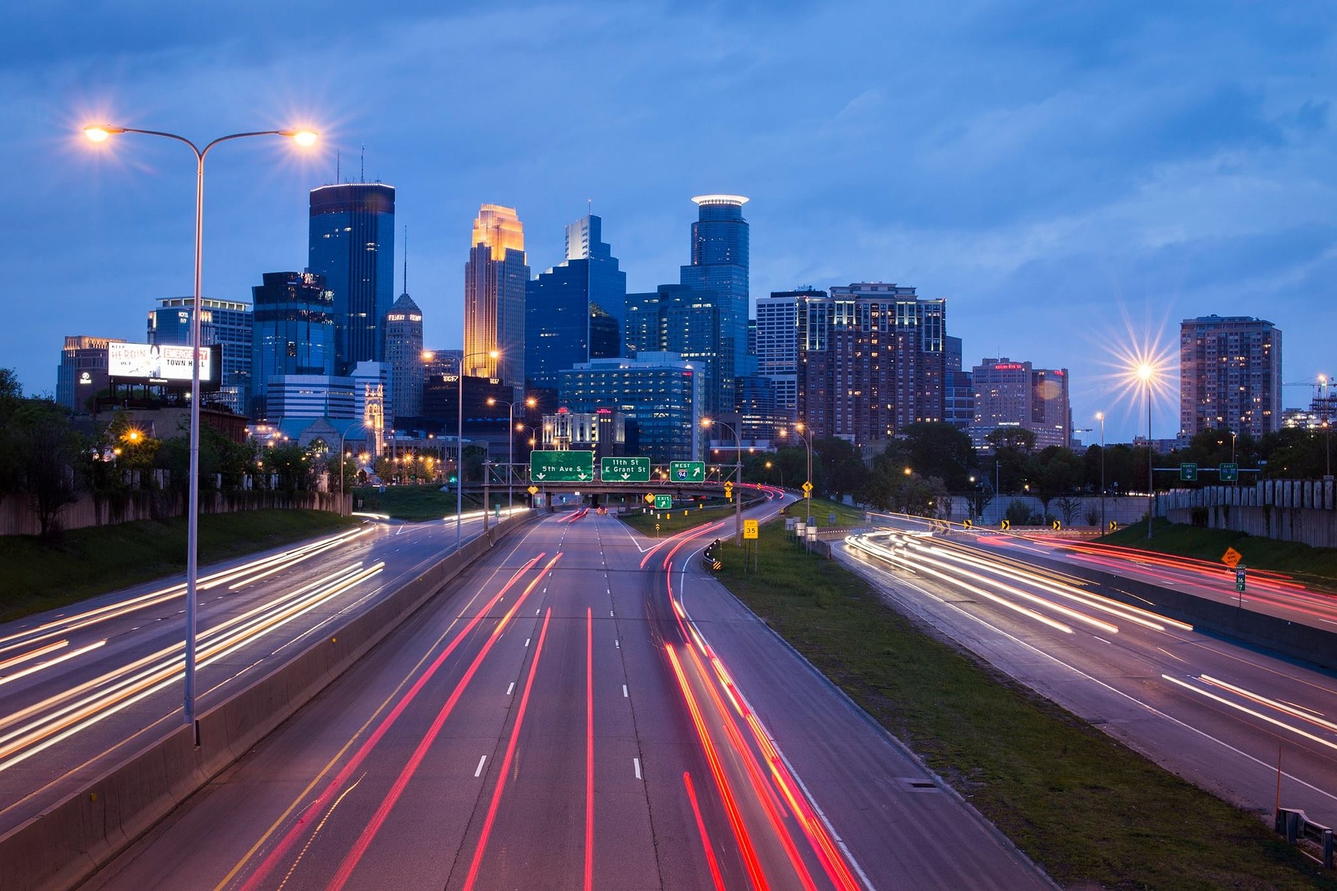 bright evening city lights and road 
