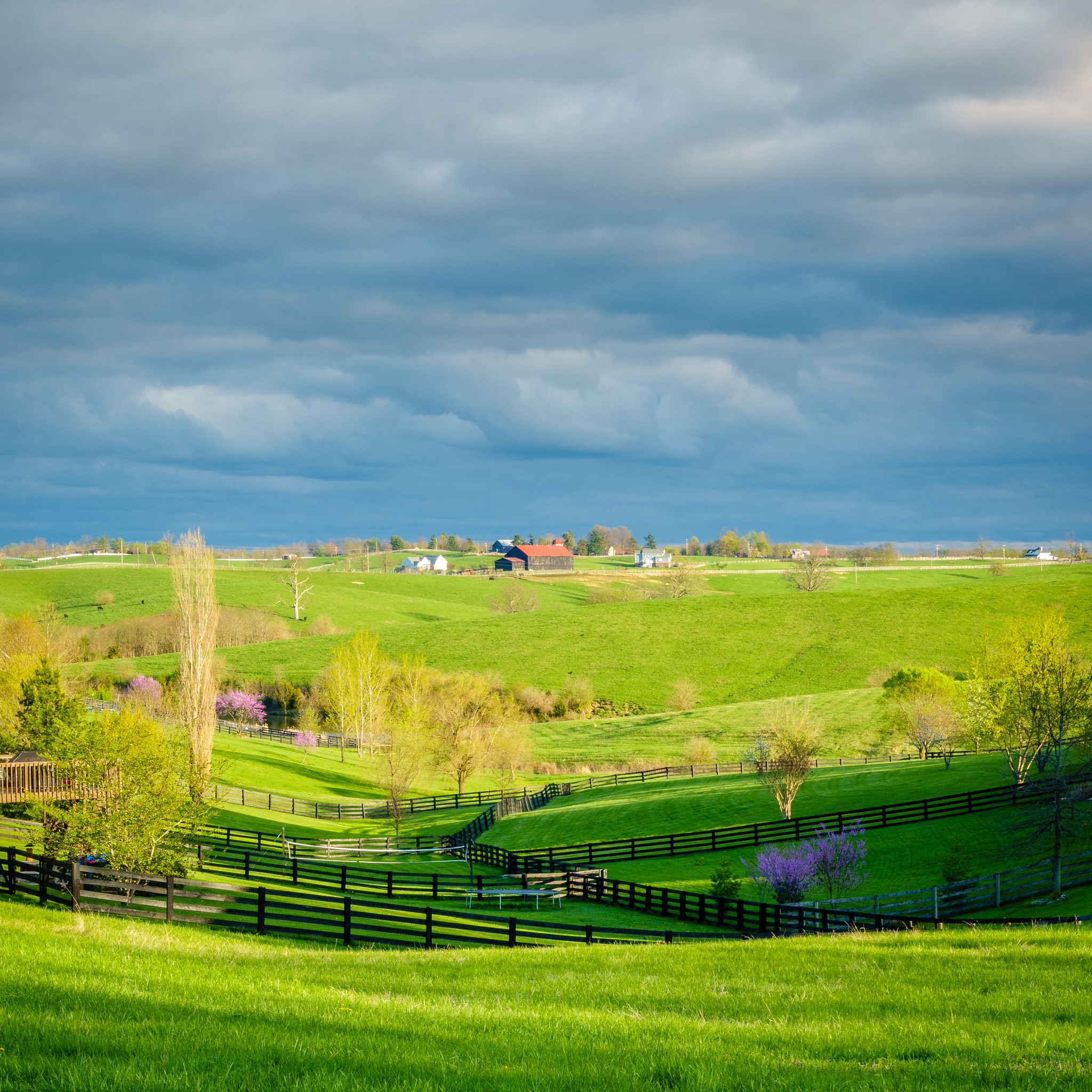 green rolling hills and farm 